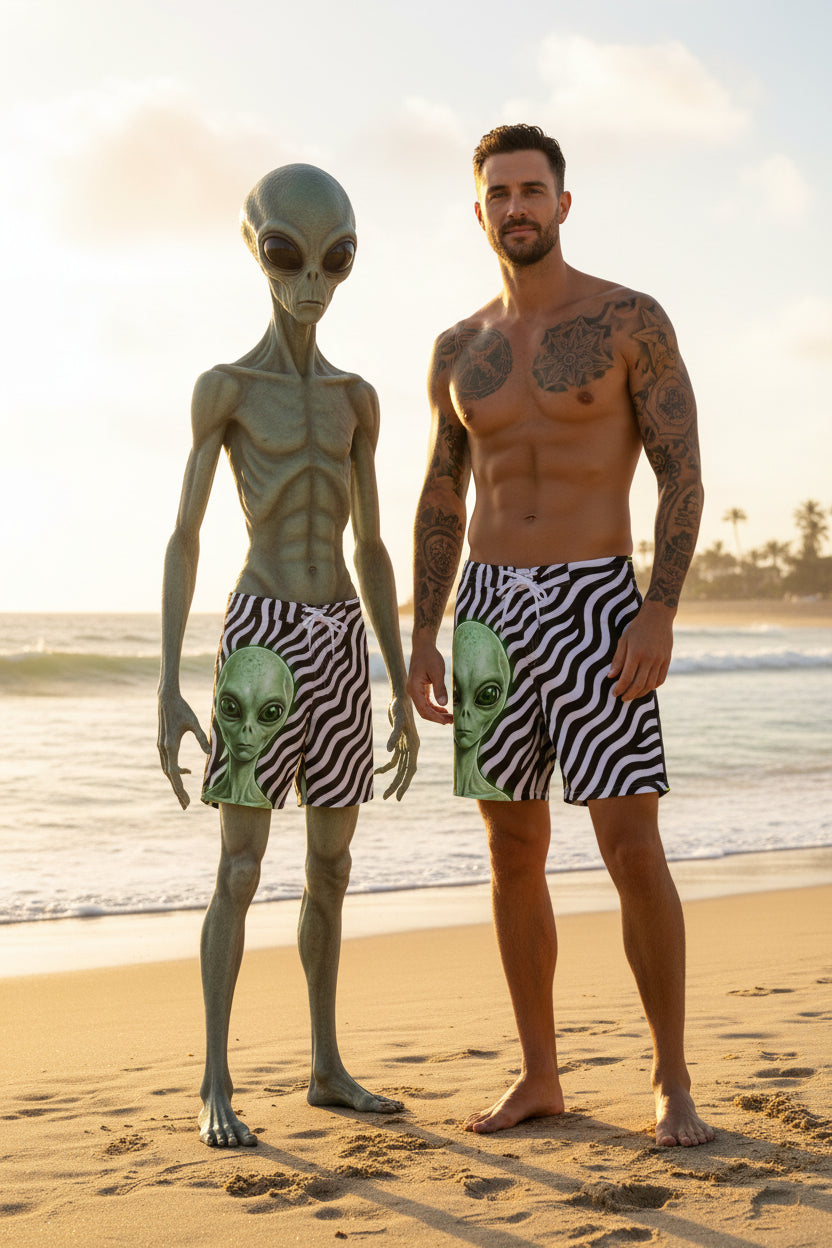 AzzBackWardz Born Smart alien board shorts front — one alien on viewer-left leg